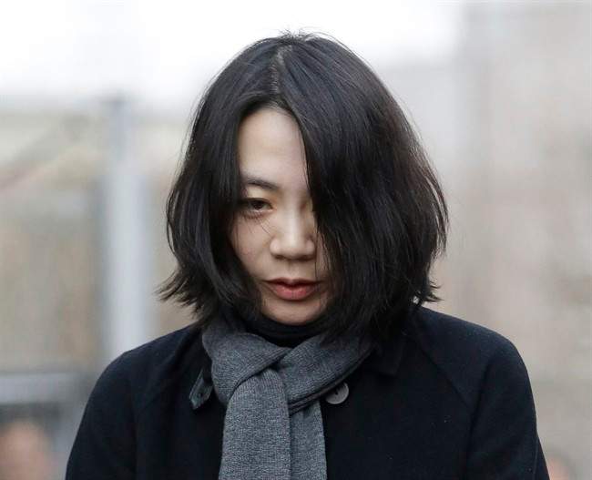 FILE - In this Dec. 12, 2014 file photo, Cho Hyun-ah, who was head of cabin service at Korean Air and the oldest child of Korean Air chairman Cho Yang-ho, speaks to the media upon her arrival for questioning at the Aviation and Railway Accident Investigation Board office of Ministry of Land, Infrastructure and Transport in Seoul, South Korea. 