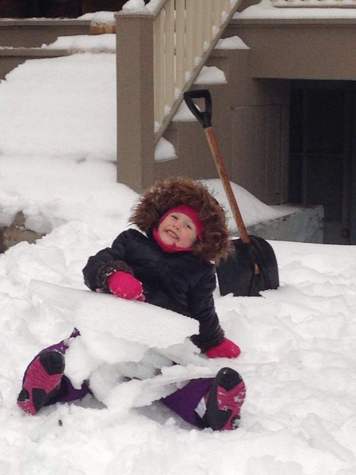 Our little one having a blast collecting 'glass ice!