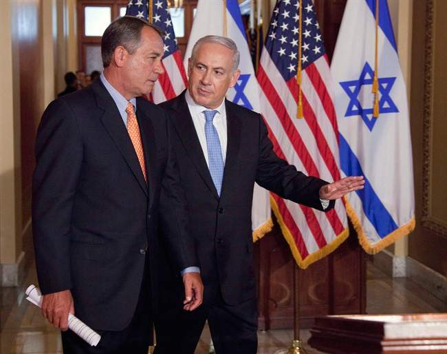 In this May 24, 2011 file photo, Israeli Prime Minister Benjamin Netanyahu walks with House Speaker John Boehner of Ohio to make a statement on Capitol Hill in Washington. Boehner has invited Netanyahu to address Congress about Iran. 