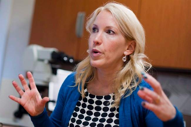 Dr. Anny Sauvageau is shown in her Edmonton office on Friday, June 21, 2011. Sauvageau, Alberta's former chief medical examiner, is suing the province, claiming political interference in her job and overpayment to funeral homes.