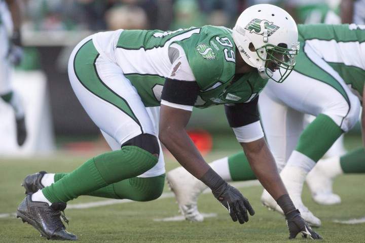 Saskatchewan Roughriders defensive end Alex Hall lines up against the Edmonton Eskimos during the second half of CFL football action in Regina, Sask., Saturday, October 12, 2013. The Riders defeat the Eskimos 14-9.