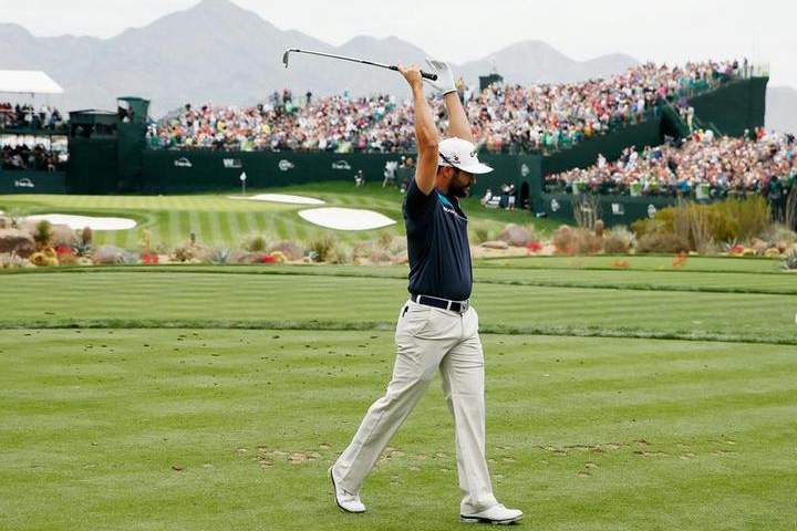 Adam Hadwin of Canada reacts to his tee shot on the 16th hole during the first round of the Waste Management Phoenix Open at TPC Scottsdale on January 29, 2015 in Scottsdale, Arizona.