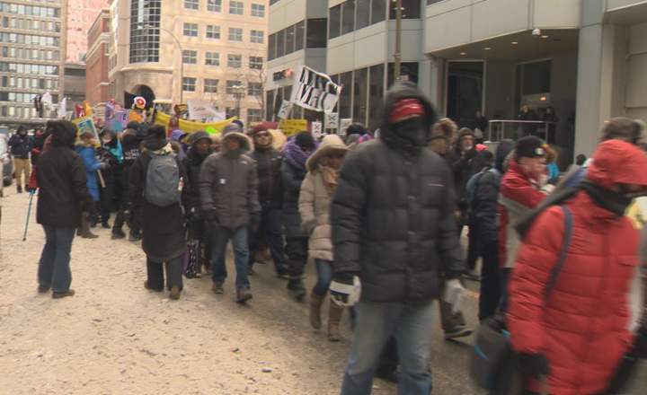 A few hundred demonstrators marched through downtown Montreal as part of a series of “disruptive actions” protesting the Quebec government’s planned austerity measures on Monday, February 23, 2015.