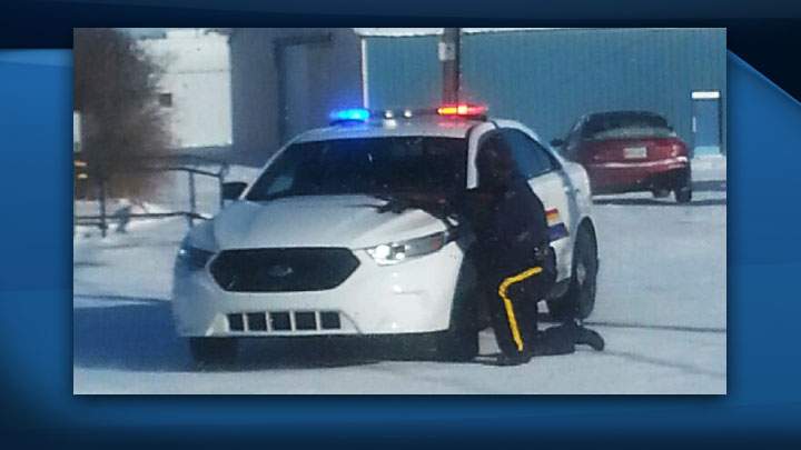 A suspect is in custody and a school lockdown has ended after a frightening day in Central Butte that saw a home surrounded by RCMP with rifles.