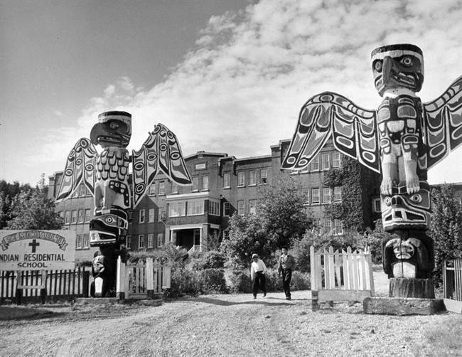 St. Michael's Indian Residential School entrance, with two students on the driveway, Alert Bay, British Columbia, is shown in this 1970 handout photo.