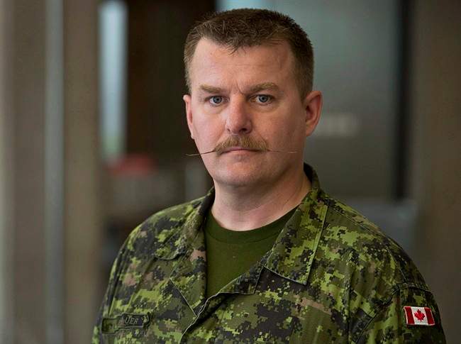 Maj. Marcus Brauer is seen in Halifax on Friday, April 11, 2014. Brauer, a 25-year veteran of the Canadian Forces who took the federal government to court over housing compensation, says a new report looking into his claims is flawed and should be tossed out. 