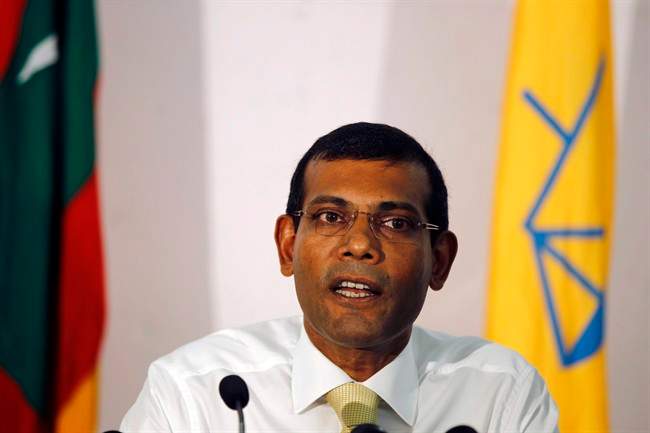 In this Nov. 10, 2013 file photo, former Maldives President and the then presidential candidate, Mohamed Nasheed, speaks to the media in Male, Maldives.