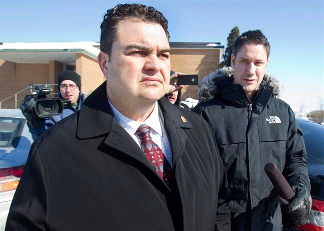Former Conservative MP Dean Del Mastro leaves court at a sentencing hearing in Lindsay, Ont., Thursday, Feb. 19, 2015. 