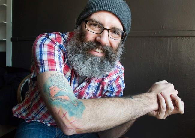 Peterborough Ont. man tattoos son's art on his arm