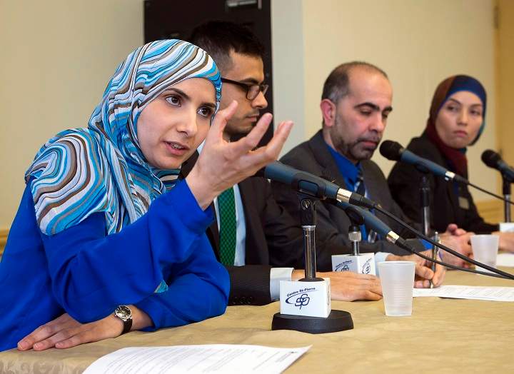 Vice-president of the Canadian Muslim Forum, Kathy Malas, left to right, speaks to reporters as Sameer Zuberi, Samer Majzoub, and Samah Jabbar look on at a news conference in Montreal on Friday, February 20, 2015.