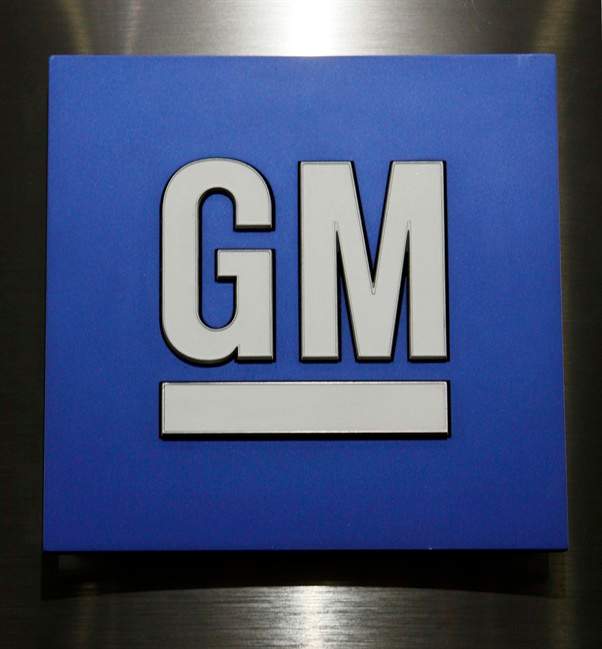 This Jan. 25, 2010, file photo, shows a General Motors Co. logo during a news conference in Detroit.