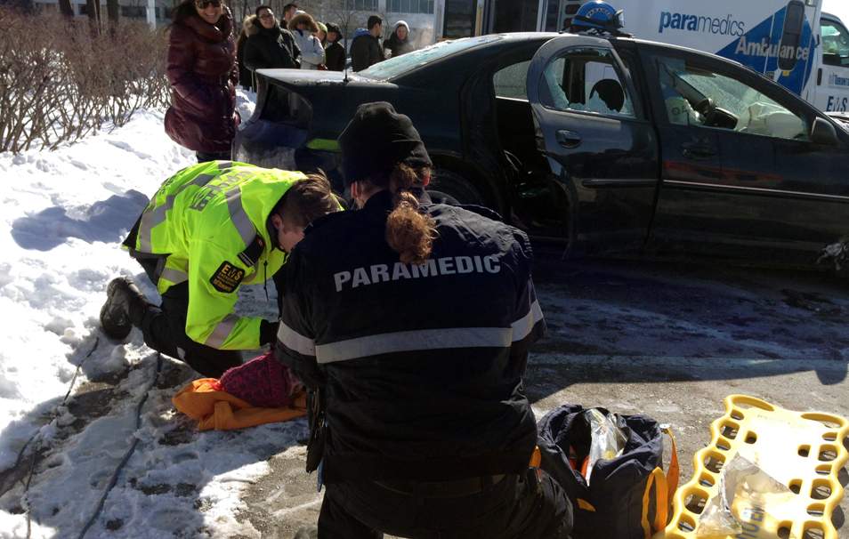 Paramedics conduct a simulation of what they encounter at an accident scene.