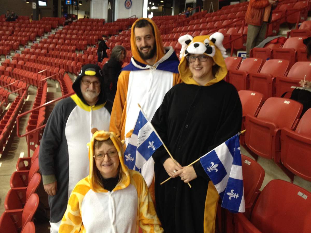 a bear, penguin, giraffe and kangaroo all in support of Quebec skip Lauren Mann.