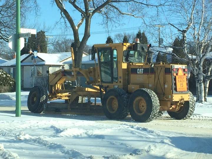 Crews were seen working in River Heights just off Grant Avenue despite a lot of cars still being parked on the street. A residential parking ban went into effect at 7 a.m. Friday.