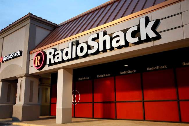 This Tuesday, Feb. 3, 2015 photo shows a RadioShack store in Dallas. The company that introduced the first mass-market personal computer, is fading after years of heavy losses and the suspension of its shares. 