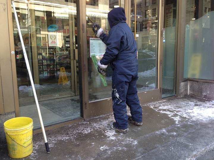 Window-washing can be a very cold task in sub-zero temperatures.