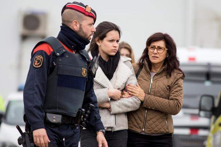 Relatives of passengers of Germanwings flight, arrive at Barcelona International Airport