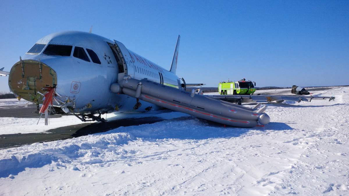 IN PHOTOS: Air Canada plane skids off runway at Halifax airport - image