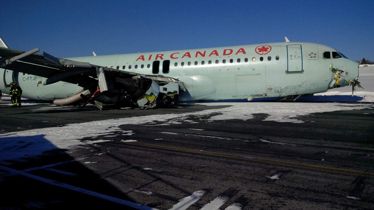 IN PHOTOS: Air Canada plane skids off runway at Halifax airport - image