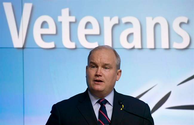 Minister of Veterans Affairs Erin O'Toole speaks during a news conference at the Department of National Defence headquarters in Ottawa on Monday March 30, 2015.