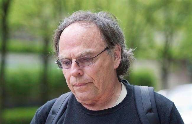 Karl Lilgert leaves the law courts in Vancouver on Monday, May 13, 2013. Lilgert, a former ferry navigator who was convicted of criminal negligence in a fatal sinking off the B.C. coast, is asking the Supreme Court of Canada to review his case. THE CANADIAN PRESS/Justin Tang.