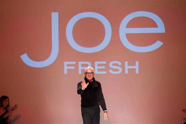 Joe Mimran greets the audience after the Joe Fresh show during Toronto Fashion Week in Toronto on March 20, 2013. 