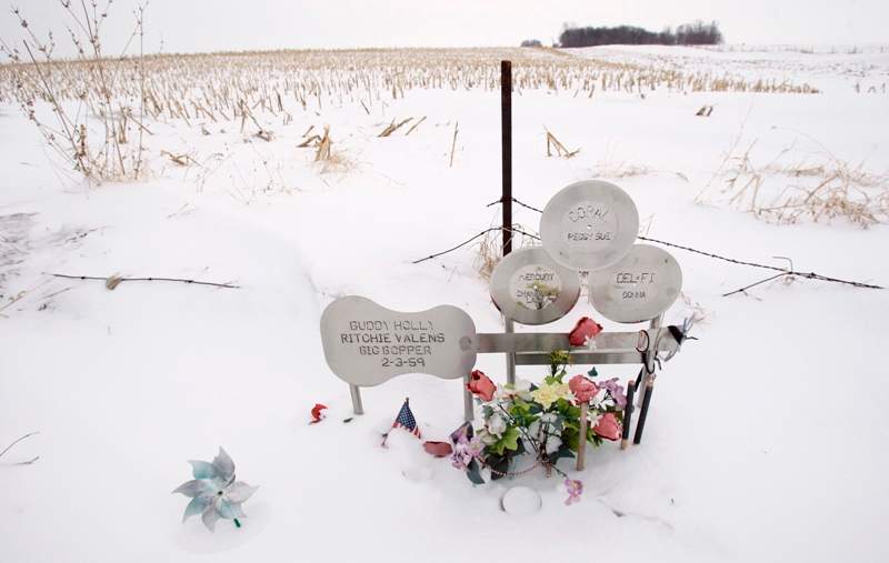 In this Friday, Jan. 9, 2009 file photo, flowers adorn a memorial at the spot where the plane carrying Buddy Holly, Ritchie Valens and J.P. “The Big Bopper” Richardson crashed killing all aboard on Feb. 3, 1959, near Clear Lake, Iowa.