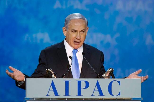 Israeli Prime Minister Benjamin Netanyahu gestures at the 2015 American Israel Public Affairs Committee Policy Conference. Netanyahu took a conciliatory tone as he prepared to form new government.