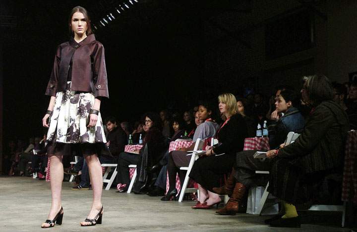 A model walks the runway during the David Dixon show during Toronto Fashion Week in Toronto Wednesday October 19, 2005.