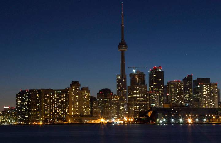 The Toronto city skyline is pictured moments after the start of Earth Hour on Saturday March 26, 2011.