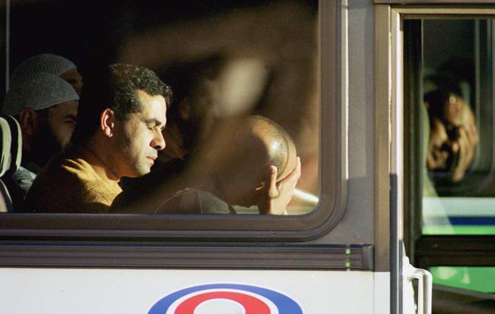 Family members of EgyptAir Flight 990 passengers are seen on a charter bus after arriving at Providence, Rhode Island, on Nov. 1, 1999, after the flight from New York’s JFK airport crashed into the Atlantic Ocean.