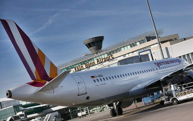 The Feb. 24, 2014 file photo shows an Airbus A320 of the airline Germanwings standing in front of the terminal at the Koeln-Bonn airport in Cologne, Germany. 