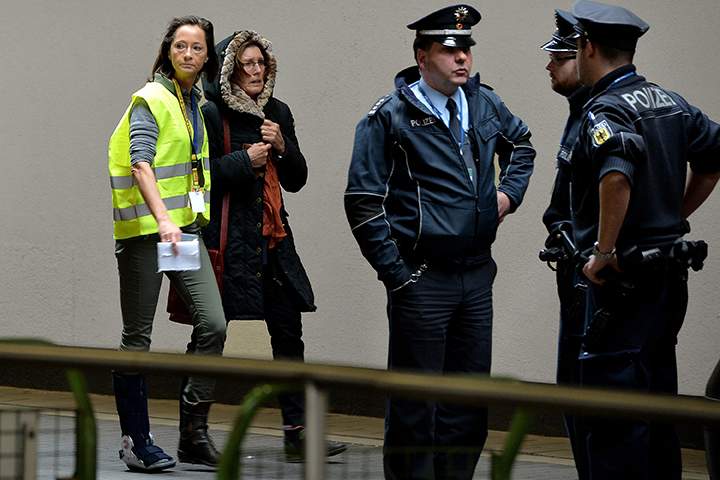 People arrive at a holding area for friends and relatives of passengers on Germanwings flight 4U9525 from Barcelona to Duesseldorf at Duesseldorf International Airport on March 24, 2015 in Duesseldorf, Germany.