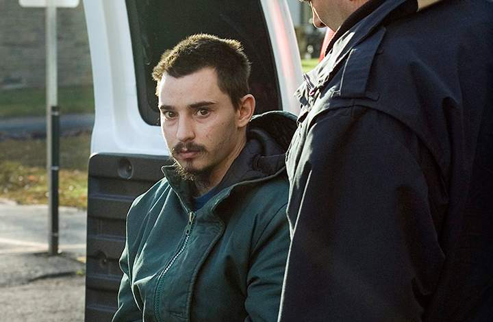 Gregory Allen Despres, the New Brunswick man accused of killing his two elderly neighbours, and beheading one of them, arrives at court for his second murder trial in Fredericton on Monday, Nov. 5, 2007.