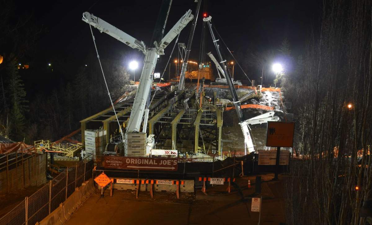 2:15 a.m. view of the 102 Avenue bridge replacement over Groat Rd. The girders on the right became warped in the middle.