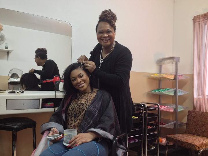 Lettia McNickle with her mother, Huelette McNickle, at the Hands of Blessings hair salon in Cote-des-Neiges.