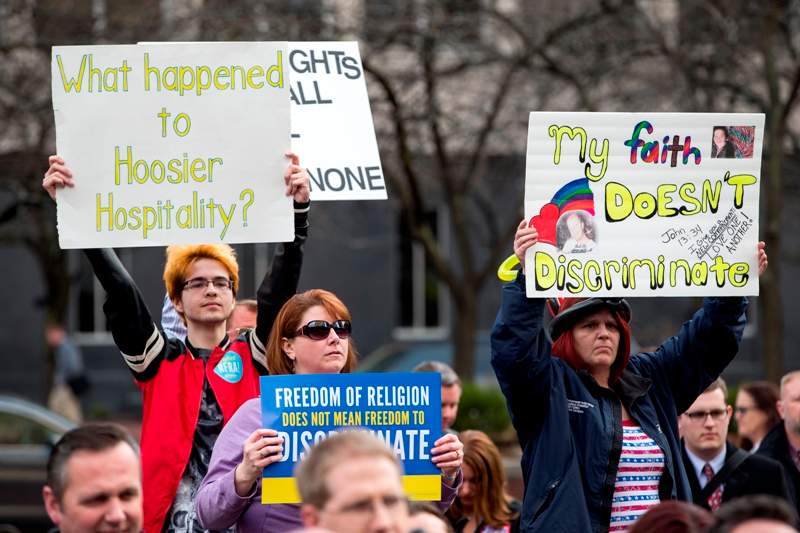 Demonstrators gather outside the City County Building on March 30, 2015 in Indianapolis, Indiana. The group called on the state house to roll back the controversial Religious Freedom Restoration Act, which critics say can be used to discriminate against gays and lesbians.