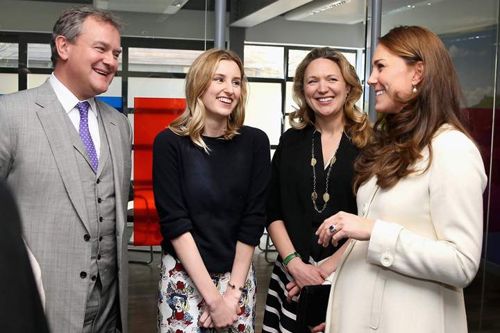 Catherine, Duchess of Cambridge chats to (L-R) Hugh Bonneville and Laura Carmichael during an official visit to the set of Downton Abbey at Ealing Studios on March 12, 2015 in London, England. (Photo by Chris Jackson - WPA Pool/Getty Images)