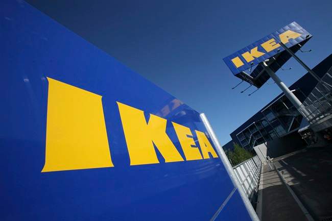 This is a Wednesday, June 18, 2008 file photo of the Ikea logo is shown on the side of the warehouse-sized store during the grand opening of New York City's first Ikea.