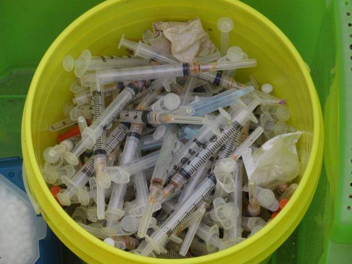 Drug den needles