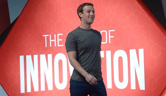 Facebook CEO Mark Zuckerberg arrives for a press conference at the Mobile World Congress, the world's largest mobile phone trade show in Barcelona, Spain, Monday, March 2, 2015.