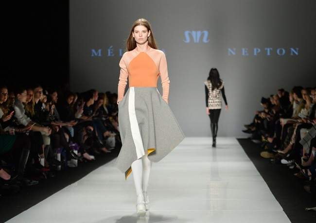 A model walks the runway for the Melissa Nepton collection during Toronto fashion week in Toronto on Tuesday, March 24, 2015.