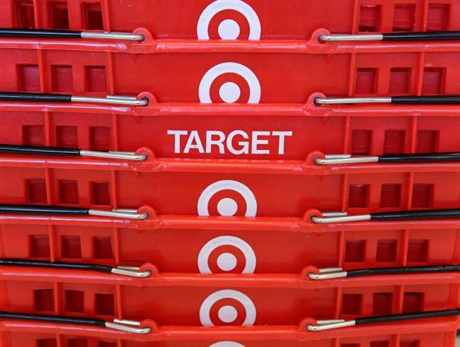 In this May 20, 2009 file photo, shopping baskets are stacked at a Chicago area Target store. 