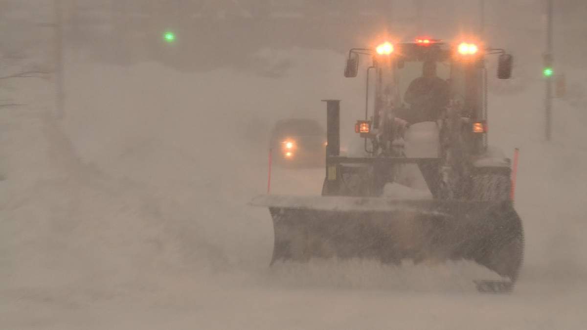 A plow makes its way up Gottingen Street on March 18.