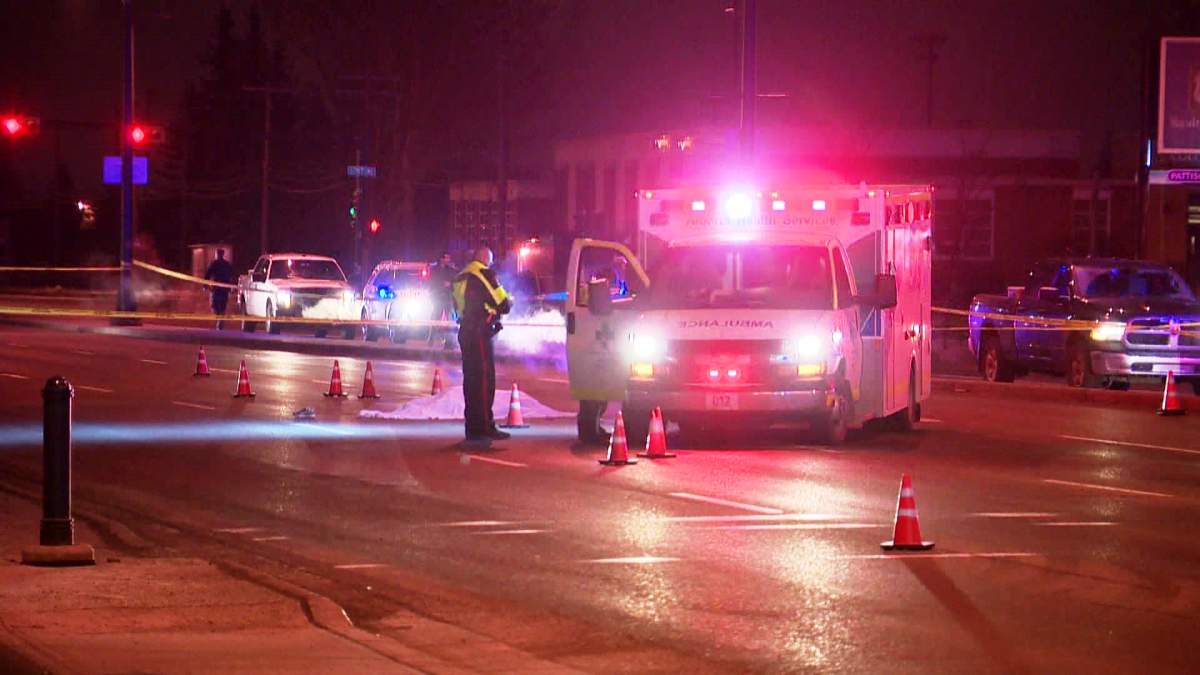 Emergency crews investigate a fatal collision along westbound 16th Avenue N.E. near 5th Street N.E. on Wednesday, March 18, 2015.