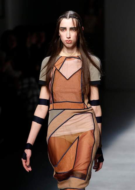 A model wears a creation for Masha Ma's fall-winter 2015-2016 ready to wear fashion collection, presented at Paris fashion week, Paris, France, Wednesday, March 11, 2015.