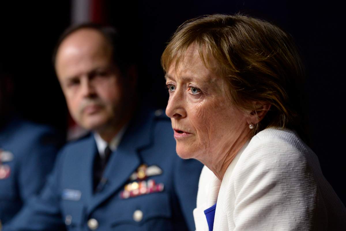 Marie Deschamps, a former Supreme Court justice and author of an inquiry into sexual misconduct in the Canadian Forces, speaks at a news conference in Ottawa on Thursday, April 30, 2015. General Tom Lawson, Chief of the Defence Staff, is at left.