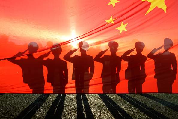 China building airstrip in contested South China Sea: report - image