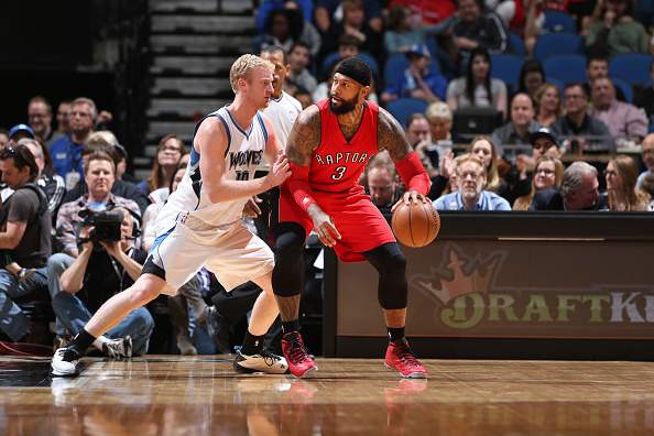 James Johnson #3 of the Toronto Raptors looks to drive to the basket against the Minnesota Timberwolves during the game on April 1, 2015 at Target Center in Minneapolis, Minnesota. 