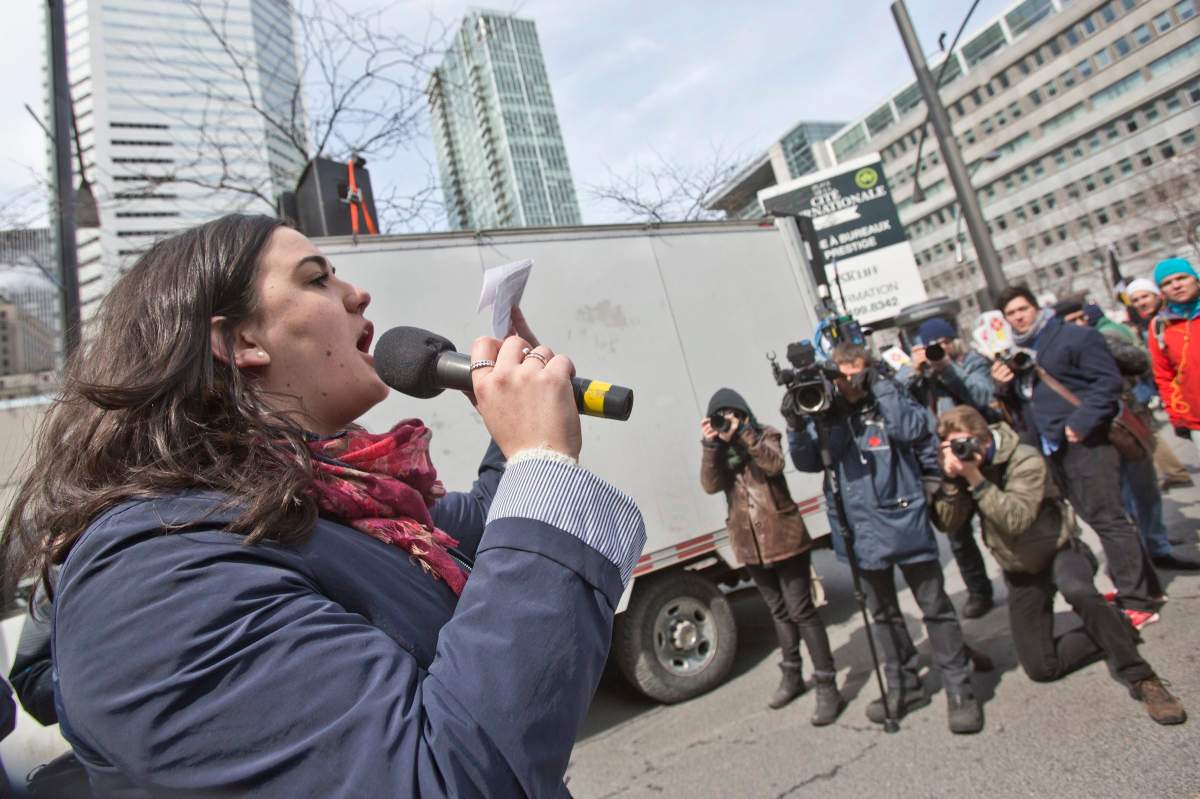 ASSE's former spokesperson Camille Godbout gives a speech during the demonstration against austerity measures in downtown Montreal, on April 2, 2015.